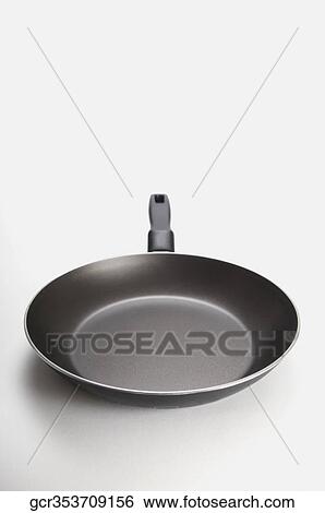Close-up of a frying pan View Large Photo Image Stock Photograph - Close-up of a frying pan. Fotosearch