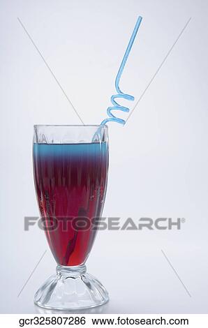 Close-up of a glass of cocktail View Large Photo Image Stock Photograph - Close-up of a glass of cocktail. Fotosearch