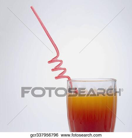 Close-up of a glass of cocktail View Large Photo Image Stock Photograph - Close-up of a glass of cocktail. Fotosearch
