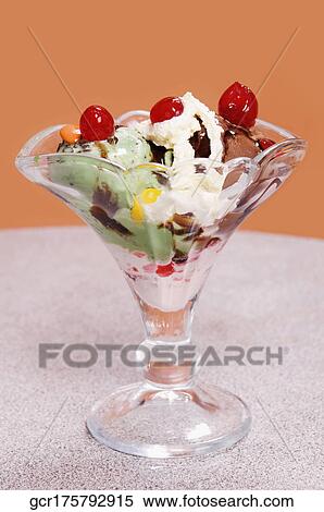 Close-up of a glass of ice cream View Large Photo Image Stock Photography - Close-up of a glass of ice cream. Fotosearch