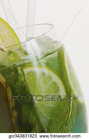 Stock Image - Close-up of a glass of lemonade drink. Fotosearch