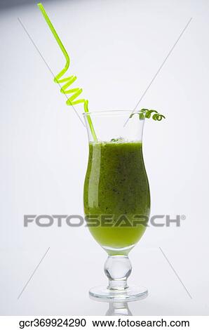 Close-up of a glass of mint cocktail View Large Photo Image Stock Image - Close-up of a glass of mint cocktail. Fotosearch
