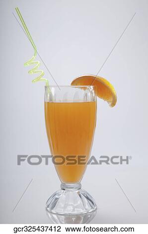 Close-up of a glass of orange juice View Large Photo Image Stock Image - Close-up of a glass of orange juice. Fotosearch