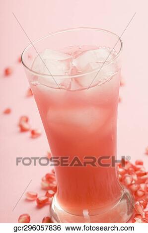 Stock Photograph - Close-up of a glass of pomegranate juice. Fotosearch