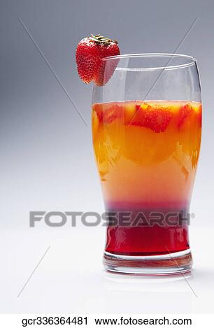 Close-up of a glass of strawberry cocktail View Large Photo Image Stock Image - Close-up of a glass of strawberry cocktail. Fotosearch