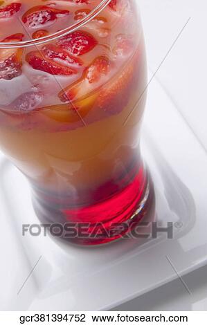 Close-up of a glass of strawberry cocktail View Large Photo Image Stock Image - Close-up of a glass of strawberry cocktail. Fotosearch