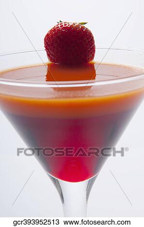 Close-up of a glass of strawberry cocktail View Large Photo Image Stock Image - Close-up of a glass of strawberry cocktail. Fotosearch