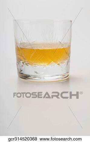 Stock Photo - Close-up of a glass of whiskey. Fotosearch