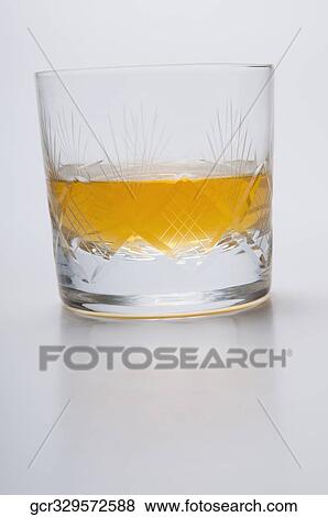 Close-up of a glass of whiskey View Large Photo Image Stock Photo - Close-up of a glass of whiskey. Fotosearch