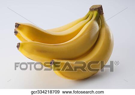 Close-up of a hand of bananas View Large Photo Image Stock Photo - Close-up of a hand of bananas. Fotosearch