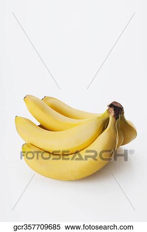 Stock Photography - Close-up of a hand of bananas. Fotosearch