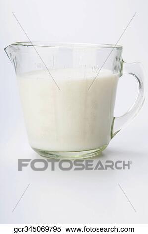Close-up of a jug of milk View Large Photo Image Stock Photography - Close-up of a jug of milk. Fotosearch