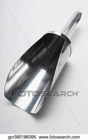 Close-up of a metal scoop View Large Photo Image Stock Photography - Close-up of a metal scoop. Fotosearch