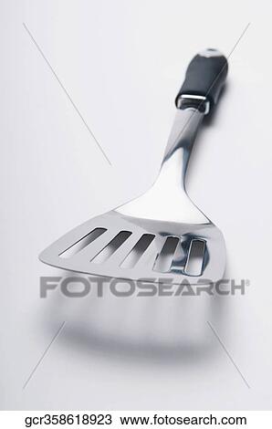 Close-up of a metal spatula View Large Photo Image Stock Image - Close-up of a metal spatula. Fotosearch