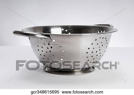 Stock Photography - Close-up of a metal strainer. Fotosearch