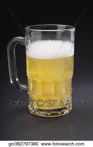 Close-up of a mug of beer View Large Photo Image Stock Image - Close-up of a mug of beer. Fotosearch