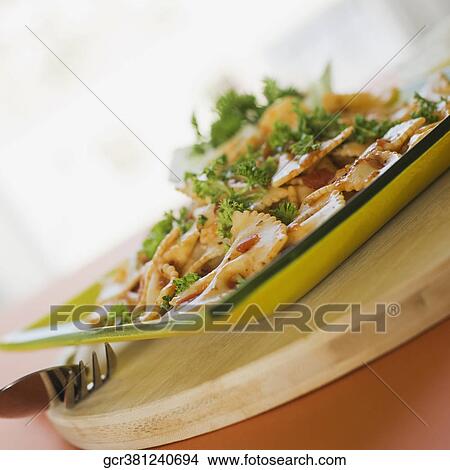 Picture - Close-up of a plate of bow tie pasta. Fotosearch