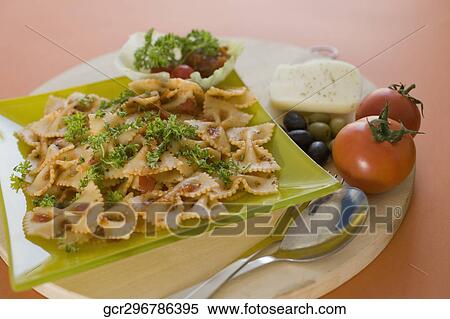 Close-up of a plate of bow tie pasta View Large Photo Image Stock Photography - Close-up of a plate of bow tie pasta. Fotosearch