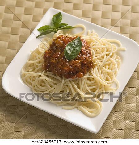 Close-up of a plate of cooked pasta View Large Photo Image Stock Photo - Close-up of a plate of cooked pasta. Fotosearch