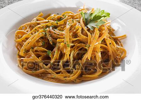 Close-up of a plate of spaghetti View Large Photo Image Stock Image - Close-up of a plate of spaghetti. Fotosearch