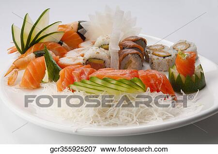 Close-up of a platter of assorted sushi View Large Photo Image Stock Photo - Close-up of a platter of assorted sushi. Fotosearch