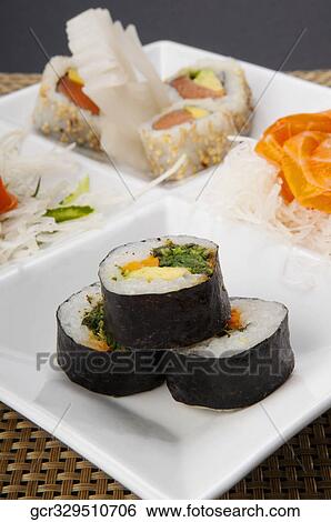 Close-up of a platter of assorted sushi View Large Photo Image Stock Photograph - Close-up of a platter of assorted sushi. Fotosearch