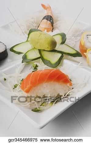 Stock Photography - Close-up of a platter of assorted sushi. Fotosearch