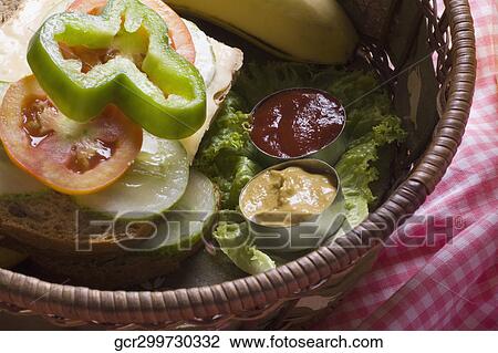 Close-up of a sandwich in a basket View Large Photo Image Stock Image - Close-up of a sandwich in a basket. Fotosearch