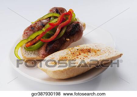Close-up of a sausage and peppers sandwich View Large Photo Image Stock Photo - Close-up of a sausage and peppers sandwich. Fotosearch