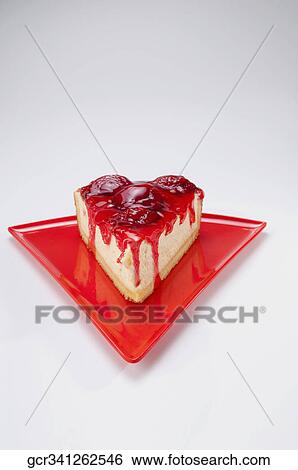 Close-up of a slice of strawberry cheesecake View Large Photo Image Stock Photograph - Close-up of a slice of strawberry cheesecake. Fotosearch