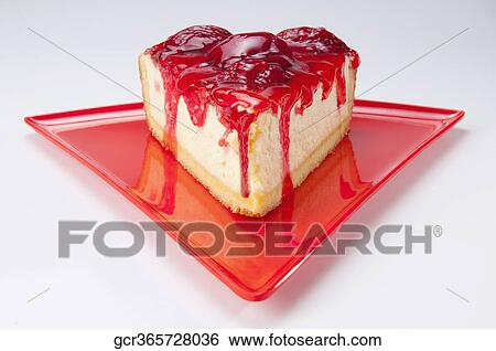 Stock Photograph - Close-up of a slice of strawberry cheesecake. Fotosearch