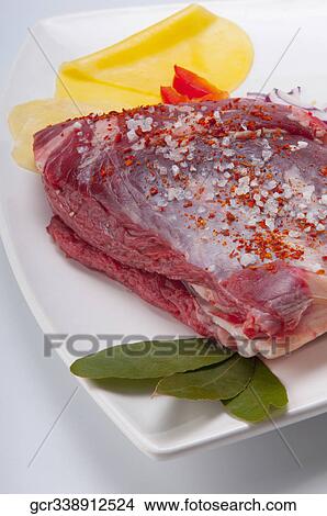 Close-up of a steak rubbed with sea salt and paprika View Large Photo Image Picture - Close-up of a steak rubbed with sea salt and paprika. Fotosearch