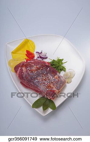 Close-up of a steak rubbed with sea salt and paprika View Large Photo Image Stock Photo - Close-up of a steak rubbed with sea salt and paprika. Fotosearch