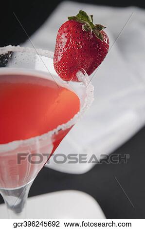 Stock Image - Close-up of a strawberry cocktail. Fotosearch