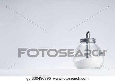 Close-up of a sugar dispenser View Large Photo Image Stock Photography - Close-up of a sugar dispenser. Fotosearch