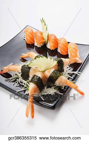 Close-up of a sushi platter View Large Photo Image Stock Photography - Close-up of a sushi platter. Fotosearch