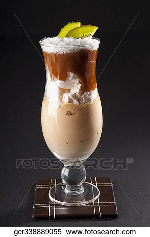 Close-up of a tropical chocolate dessert in a glass View Large Photo Image Stock Photography - Close-up of a tropical chocolate dessert in a glass. Fotosearch