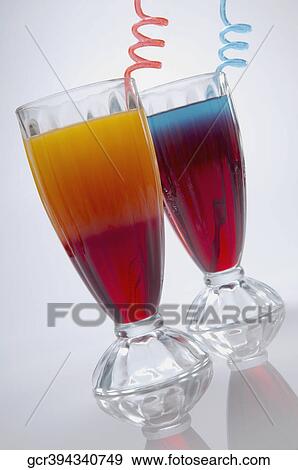 Close-up of a two glasses of cocktails View Large Photo Image Stock Photo - Close-up of a two glasses of cocktails. Fotosearch