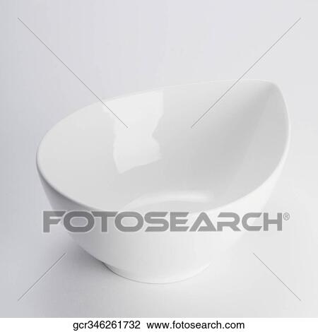 Close-up of a white ceramic bowl View Large Photo Image Stock Image - Close-up of a white ceramic bowl. Fotosearch