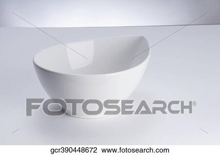 Close-up of a white ceramic bowl View Large Photo Image Stock Image - Close-up of a white ceramic bowl. Fotosearch