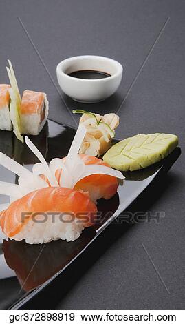 Close-up of an assorted sushi platter View Large Photo Image Stock Photo - Close-up of an assorted sushi platter. Fotosearch