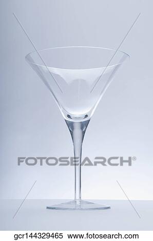 Close-up of an empty martini glass View Large Photo Image Stock Photography - Close-up of an empty martini glass. Fotosearch