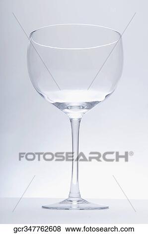 Close-up of an empty wine glass View Large Photo Image Stock Photo - Close-up of an empty wine glass. Fotosearch