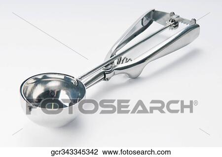 Stock Image - Close-up of an ice cream scoop. Fotosearch
