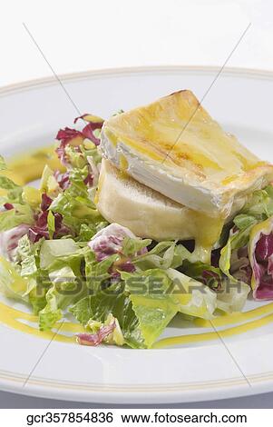Close-up of an open sandwich on a lettuce salad View Large Photo Image Stock Photograph - Close-up of an open sandwich on a lettuce salad. Fotosearch