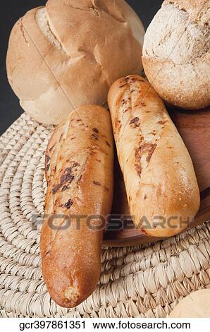 Close-up of assorted bread rolls and scones View Large Photo Image Stock Image - Close-up of assorted bread rolls and scones. Fotosearch