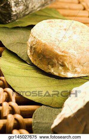 Close-up of assorted cheese on a bamboo platter View Large Photo Image Stock Photography - Close-up of assorted cheese on a bamboo platter. Fotosearch