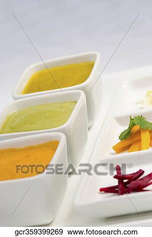 Close-up of assorted dips View Large Photo Image Stock Photo - Close-up of assorted dips. Fotosearch