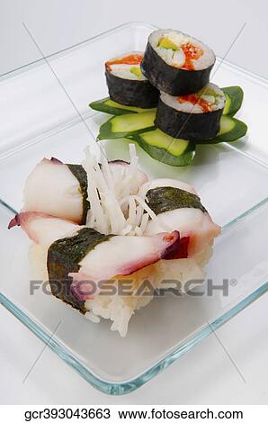 Close-up of assorted sushi on a platter View Large Photo Image Stock Image - Close-up of assorted sushi on a platter. Fotosearch