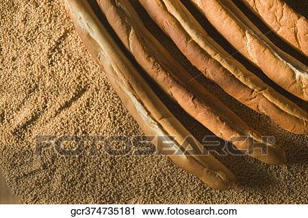 Close-up of baguettes with sesame seeds View Large Photo Image Stock Image - Close-up of baguettes with sesame seeds. Fotosearch